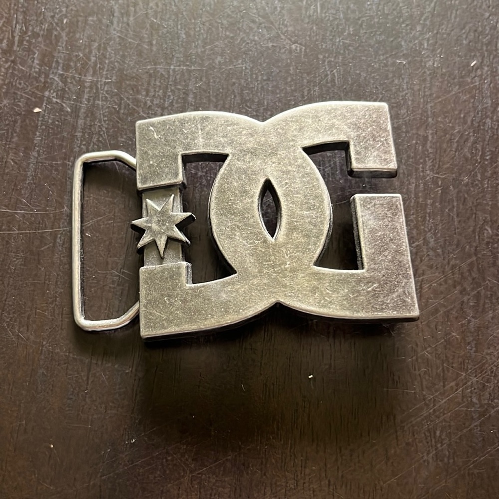 Dc belt buckle